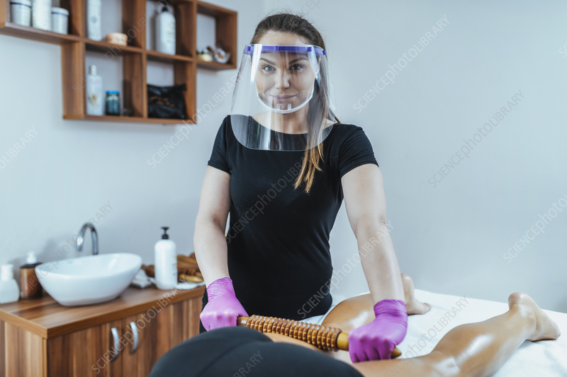 Madero Massage Therapist Wearing PPE Stock Image F035 0608