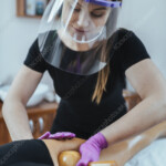 Madero Massage Therapist Wearing PPE Stock Image F035 0609